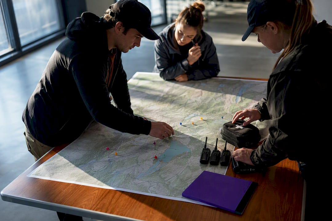 Volunteers coordinating a community search